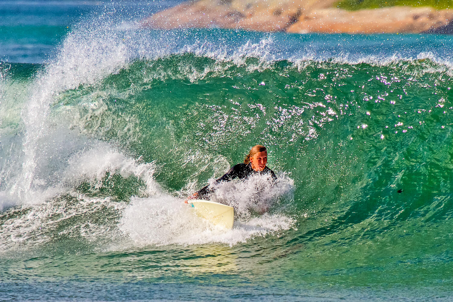 Surfing at Bicheno near Coles Bay, Tasmania